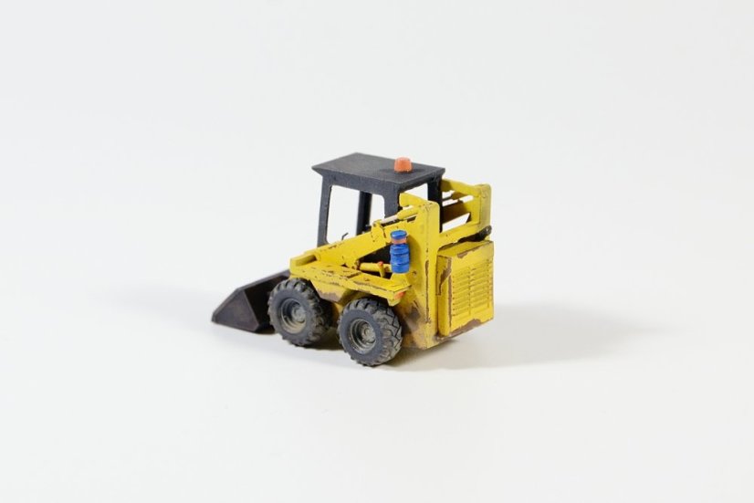 Smykový nakladač UNC 060 - Měřítko: 1:87